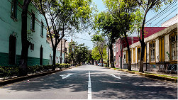 A neighborhood street, representing location as a factor.